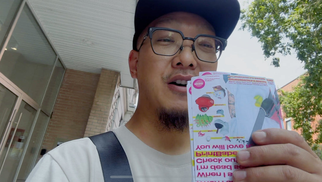 Owner of PrintBabe holding flyers on the street of Montreal