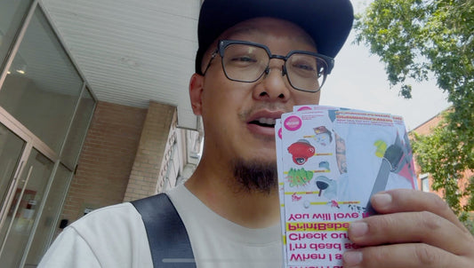Owner of PrintBabe holding flyers on the street of Montreal